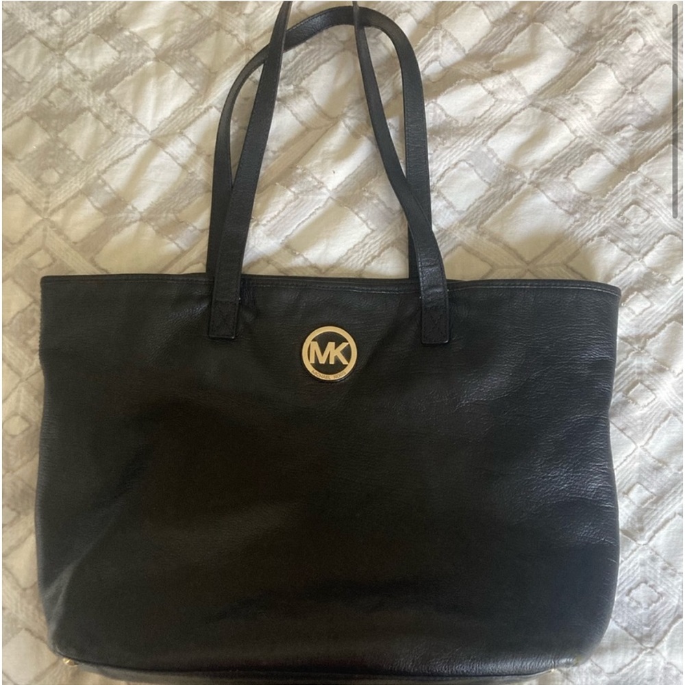 Black Michael Kors large tote bag. Gold accents.